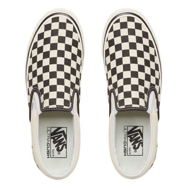 Black checkerboard 2024 vans slides