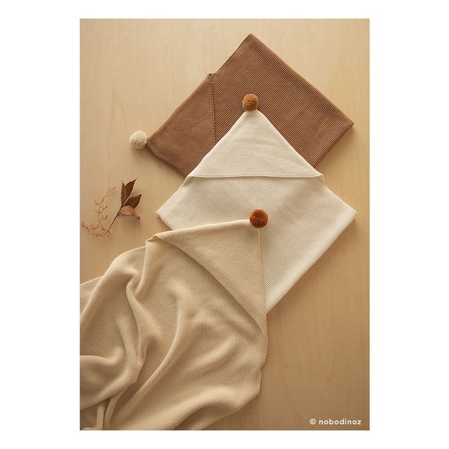 So Natural knitted cape in organic cotton | Milk