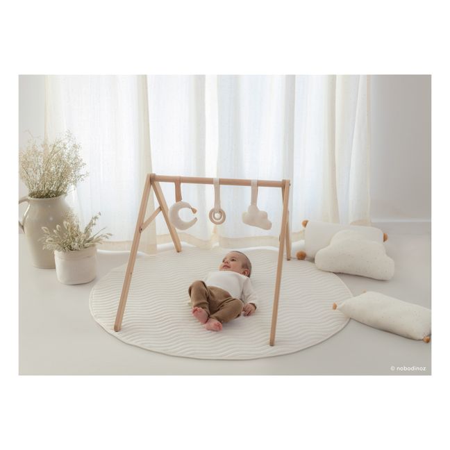 Arco de estímulo de madera y sus juguetes | Crema