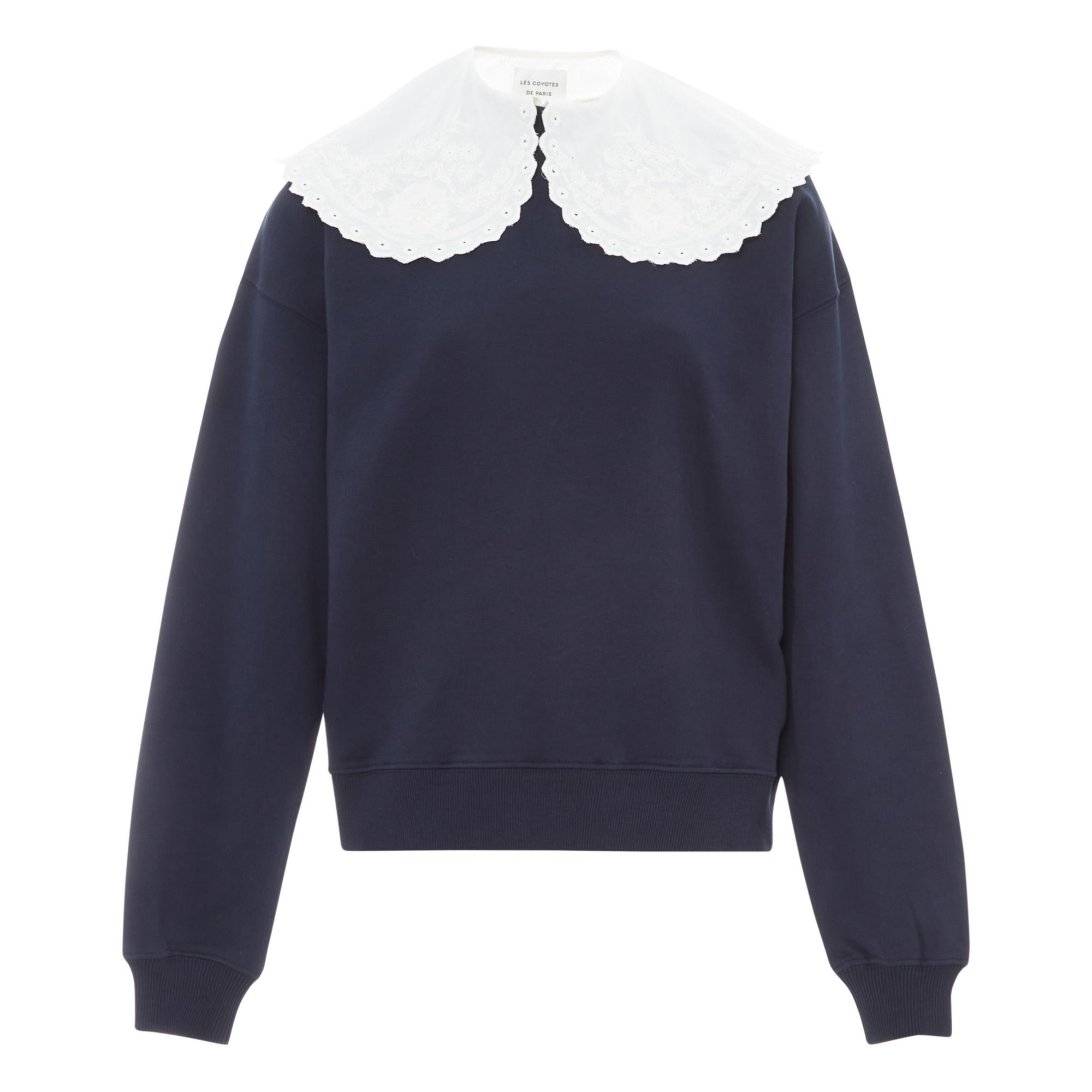 navy blue jumper with white collar