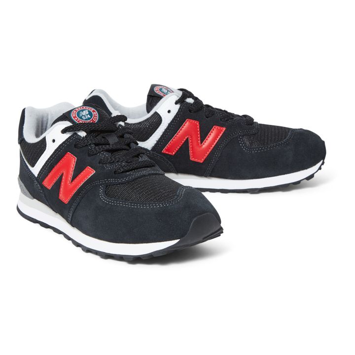 New balance 574 store black with pomelo