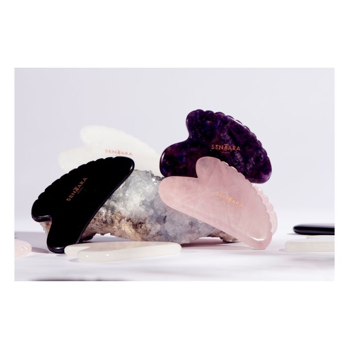Gua Sha Corazón con dientes de cuarzo rosa- Imagen del producto n°1
