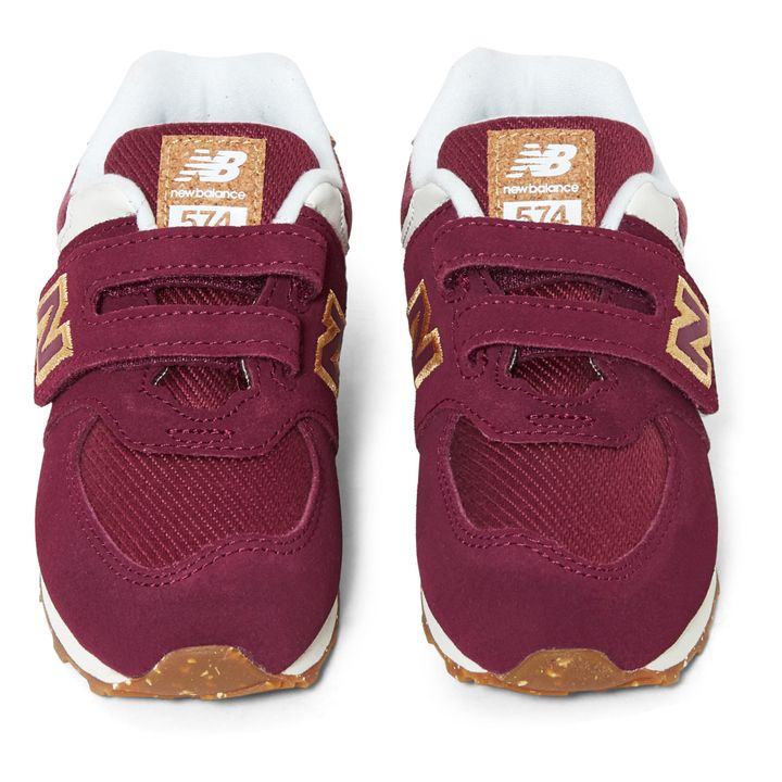 New balance shop burgundy niño