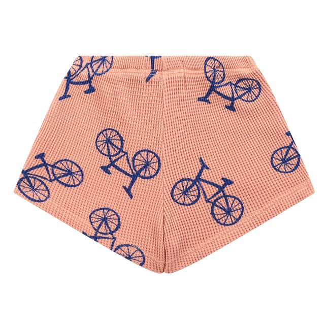 Pantalón corto de algodón orgánico con nido de abeja Bicicletas bebé Albaricoque
