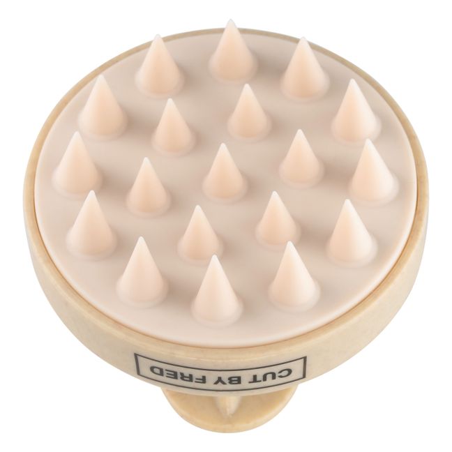 Brosse stimulante pour le cuir chevelu