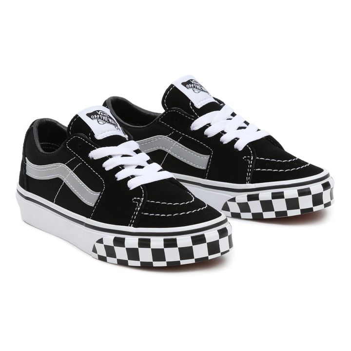 Black vans best sale with checkered stripe