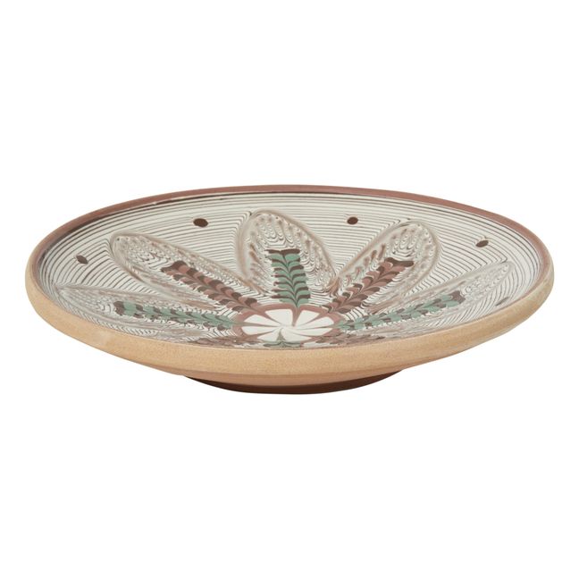 Plato de cerámica con motivos florales y lunares