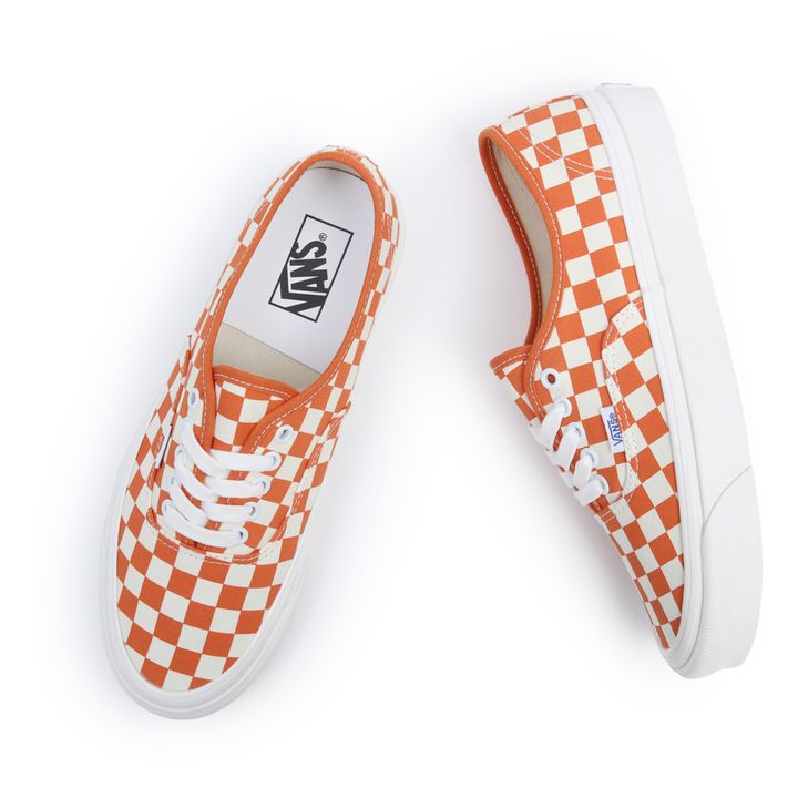 Orange and white hot sale checkered vans