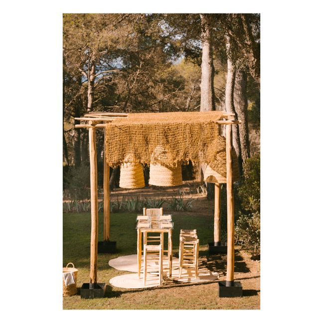 Tabouret de bar en bois brut et palme