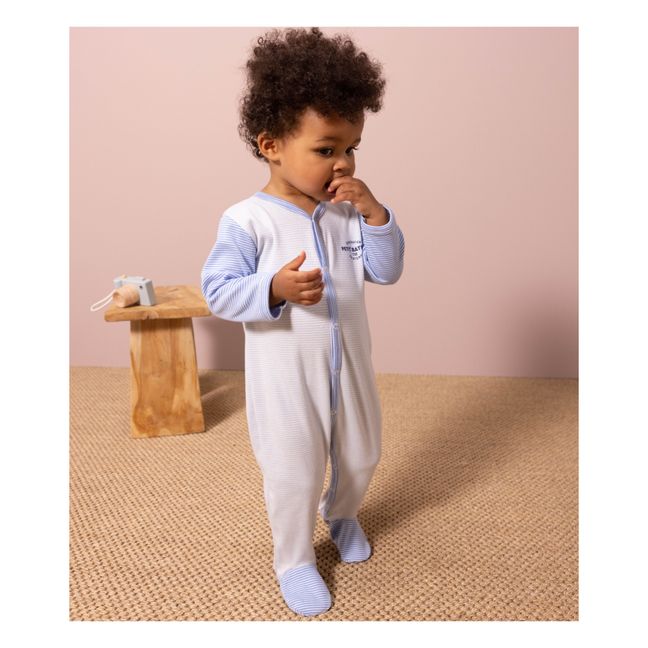 Pijama con pies estampado de algodón orgánico | Azul