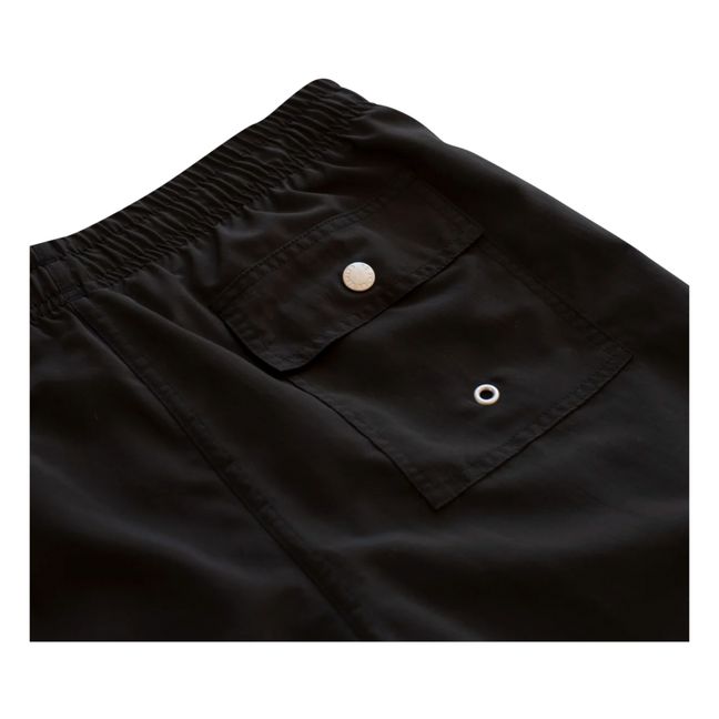 Pantaloncini del costume da bagno in tinta unita, in tessuto riciclato | Nero