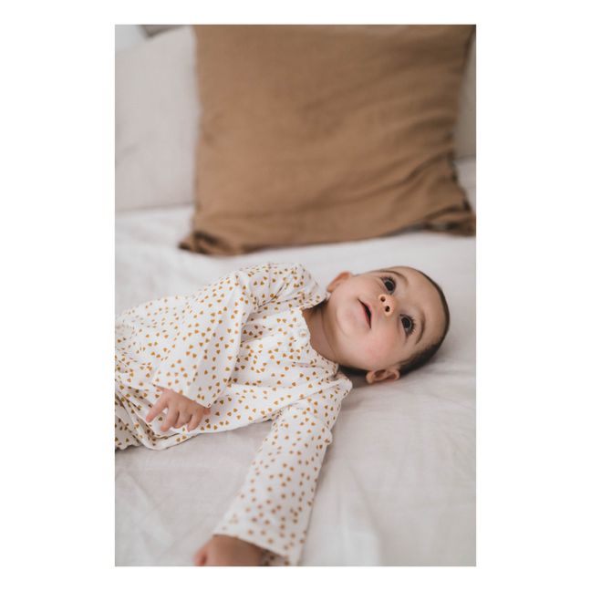 Pyjama mit Füßchen aus Jersey Amalia Miniherzen | Senffarben