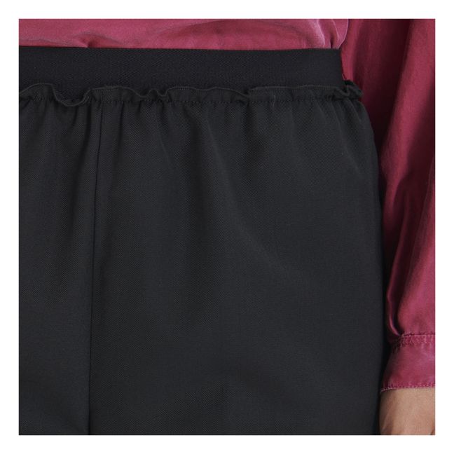 Pantalones elásticos de lana | Negro