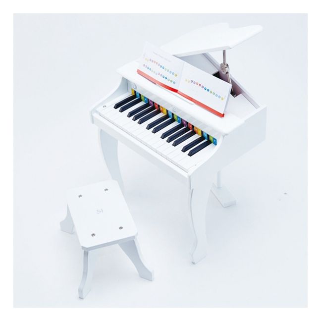 Pianoforte elettrico con il suo sgabello 