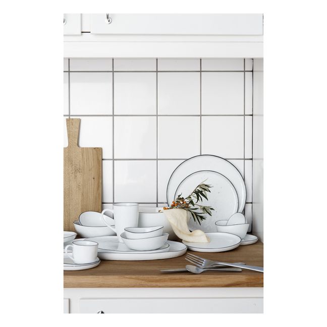 Tasse mit Untertasse aus Porzellan Salt